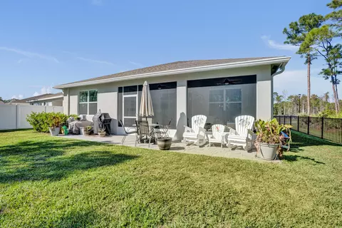 Exterior - 6651 SE Park Trace Dr, Stuart, FL 34997 photo 4 of 8