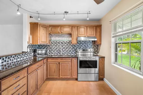 Kitchen - 5709 SE Indigo Ave, Stuart, FL 34997 photo 2 of 4
