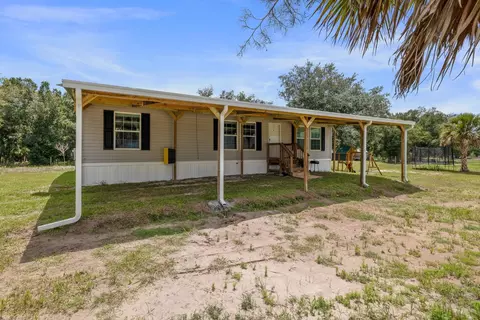 Exterior - 22382 NW 286th St, Okeechobee, FL 34972 photo 2 of 4