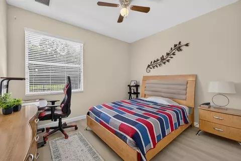 Bedroom - 755 SW River Bend Cir, Stuart, FL 34997 photo 4 of 9