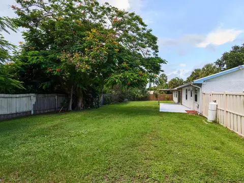 Exterior - 296 SE Wentworth Dr, Stuart, FL 34996 photo 3 of 11