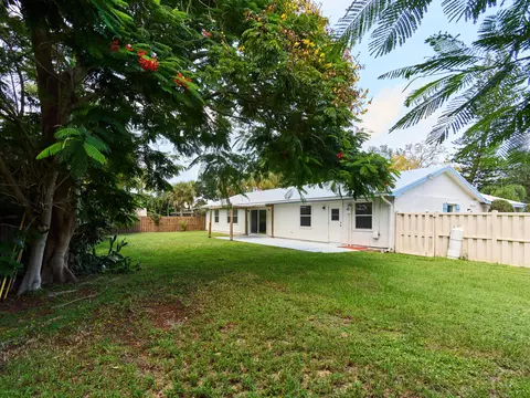 Exterior - 296 SE Wentworth Dr, Stuart, FL 34996 photo 4 of 11