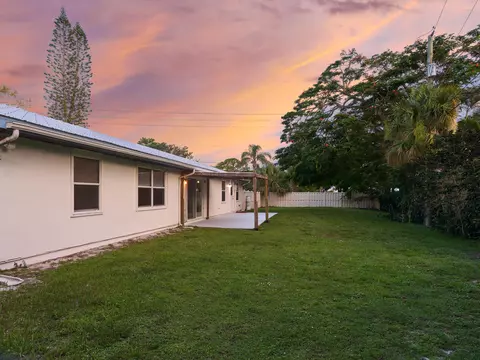 Exterior - 296 SE Wentworth Dr, Stuart, FL 34996 photo 6 of 11