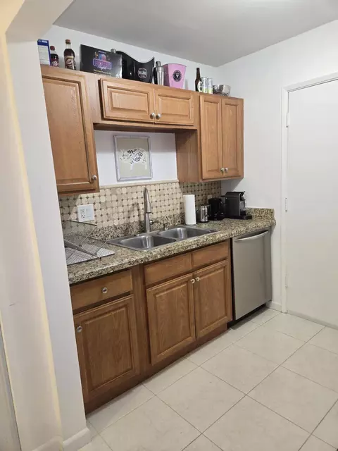 Kitchen - 101 E Mcnab Rd #217, Pompano Beach, FL 33060 photo 1 of 3
