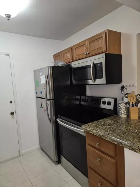 Kitchen - 101 E Mcnab Rd #217, Pompano Beach, FL 33060 photo 3 of 3