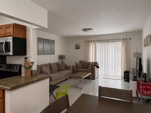 Living - 101 E Mcnab Rd #217, Pompano Beach, FL 33060 photo 2 of 2