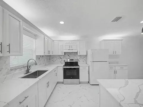 Kitchen - 3961 SE Dixie Ross St, Stuart, FL 34997 photo 1 of 5