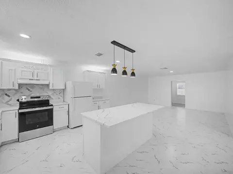 Kitchen - 3961 SE Dixie Ross St, Stuart, FL 34997 photo 3 of 5