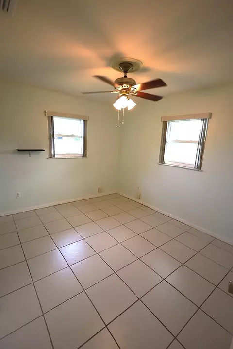 Bedroom - 5572 SE Cable Dr, Stuart, FL 34997 photo 2 of 4