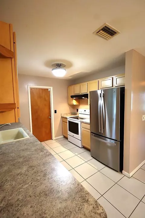 Kitchen - 5572 SE Cable Dr, Stuart, FL 34997 photo 1 of 2