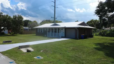 Exterior - 5572 SE Cable Dr, Stuart, FL 34997 photo 3 of 4