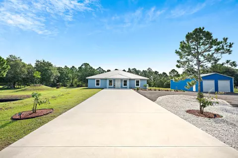 Exterior - 2600 NE 103rd Ave, Okeechobee, FL 34974 photo 2 of 9