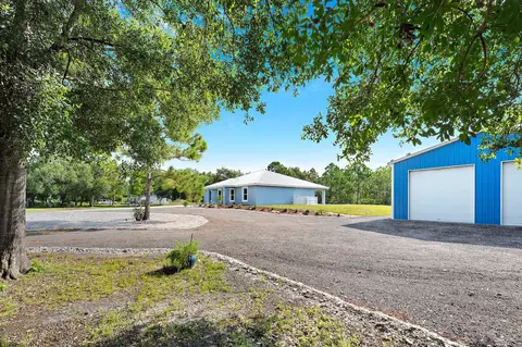 Exterior - 2600 NE 103rd Ave, Okeechobee, FL 34974 photo 6 of 9