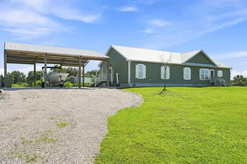 Exterior - 4944 NE 115th Pl, Okeechobee, FL 34972 photo 7 of 12