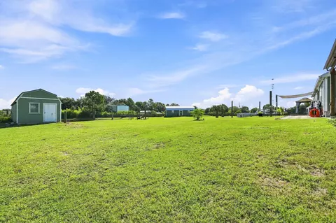 Exterior - 4944 NE 115th Pl, Okeechobee, FL 34972 photo 5 of 12