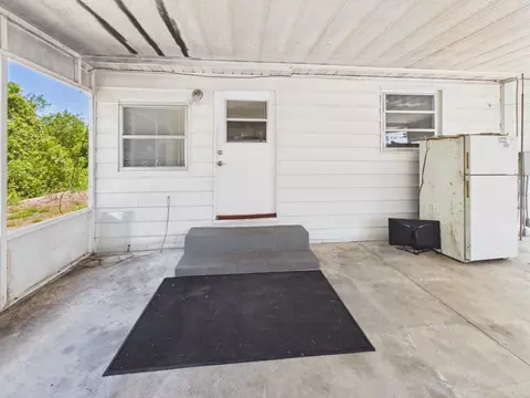 Exterior - 10601 SE 125th Trl, Okeechobee, FL 34974 photo 3 of 6
