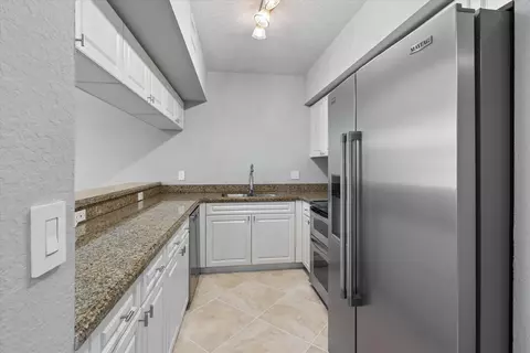 Kitchen - 6376 W Sample Rd #6376, Coral Springs, FL 33067 photo 2 of 4