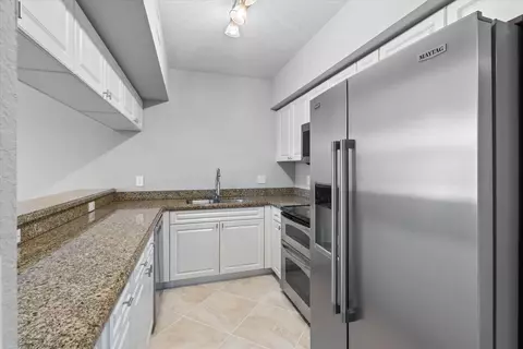 Kitchen - 6376 W Sample Rd #6376, Coral Springs, FL 33067 photo 4 of 4