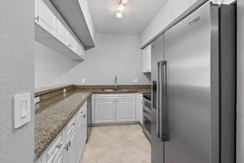 Kitchen - 6376 W Sample Rd #6376, Coral Springs, FL 33067 photo 2 of 4