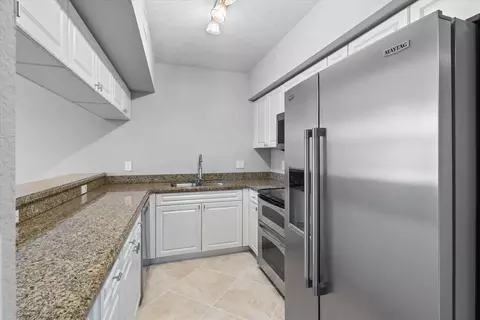 Kitchen - 6376 W Sample Rd #6376, Coral Springs, FL 33067 photo 4 of 4