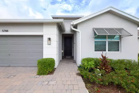 Exterior - 5788 SE Skyblue Cir, Stuart, FL 34997 photo 3 of 16