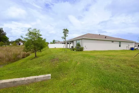 Exterior - 5788 SE Skyblue Cir, Stuart, FL 34997 photo 12 of 16