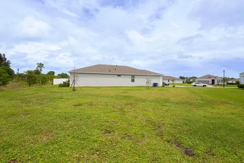 Exterior - 5788 SE Skyblue Cir, Stuart, FL 34997 photo 13 of 16