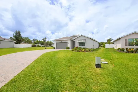 Exterior - 5788 SE Skyblue Cir, Stuart, FL 34997 photo 5 of 16