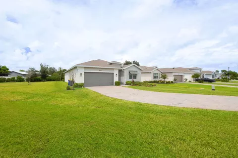 Exterior - 5788 SE Skyblue Cir, Stuart, FL 34997 photo 4 of 16