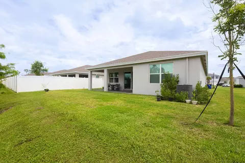 Exterior - 5788 SE Skyblue Cir, Stuart, FL 34997 photo 9 of 16