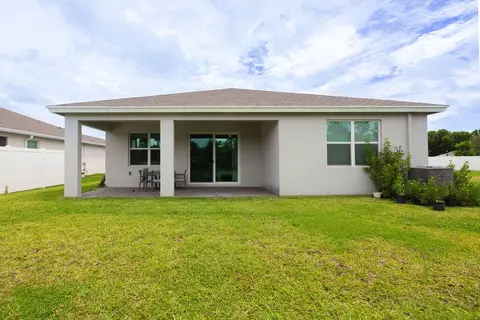 Exterior - 5788 SE Skyblue Cir, Stuart, FL 34997 photo 8 of 16