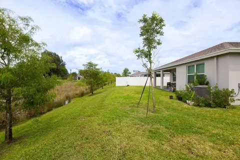Exterior - 5788 SE Skyblue Cir, Stuart, FL 34997 photo 10 of 16