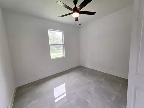 Bedroom - 702 NW 39th Cir, Okeechobee, FL 34972 photo 4 of 6