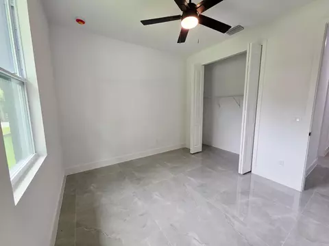 Bedroom - 702 NW 39th Cir, Okeechobee, FL 34972 photo 3 of 6