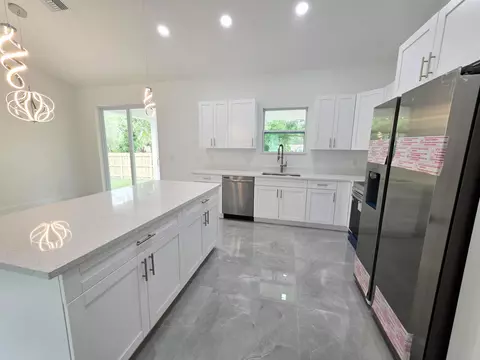Kitchen - 702 NW 39th Cir, Okeechobee, FL 34972 photo 1 of 3