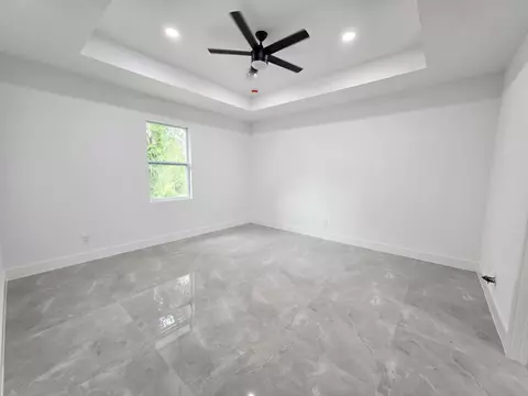 Bedroom - 702 NW 39th Cir, Okeechobee, FL 34972 photo 1 of 6