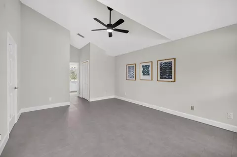 Bedroom - 6193 SE Windsong Ln, Stuart, FL 34997 photo 1 of 7