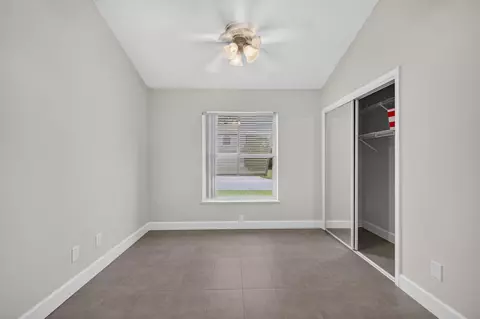 Bedroom - 6193 SE Windsong Ln, Stuart, FL 34997 photo 2 of 7