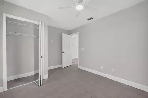 Bedroom - 6193 SE Windsong Ln, Stuart, FL 34997 photo 5 of 7