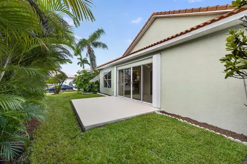 Exterior - 6193 SE Windsong Ln, Stuart, FL 34997 photo 6 of 7