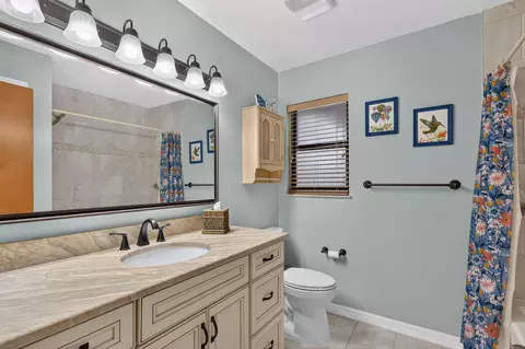 Bath - 5673 SE Lamay Dr, Stuart, FL 34997 photo 2 of 4