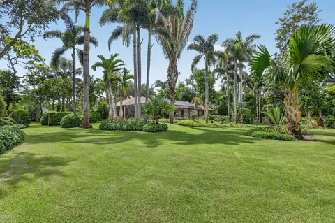 Exterior - 5673 SE Lamay Dr, Stuart, FL 34997 photo 5 of 16