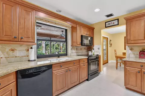 Kitchen - 5673 SE Lamay Dr, Stuart, FL 34997 photo 1 of 3