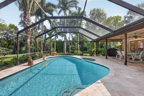 Exterior - 5673 SE Lamay Dr, Stuart, FL 34997 photo 4 of 16