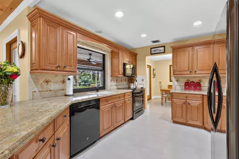 Kitchen - 5673 SE Lamay Dr, Stuart, FL 34997 photo 3 of 3