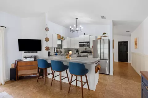 Kitchen - 6702 SE Raintree Ave, Stuart, FL 34997 photo 3 of 5