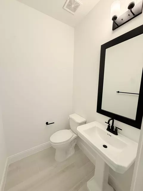 Bath - 121 SE Birch Ter, Stuart, FL 34997 photo 1 of 3