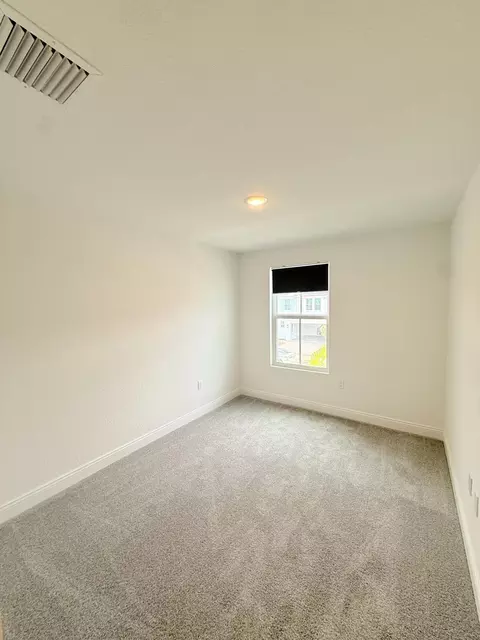 Bedroom - 121 SE Birch Ter, Stuart, FL 34997 photo 2 of 3