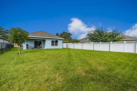 Exterior - 5557 SE Isabelita Ave, Stuart, FL 34997 photo 5 of 6