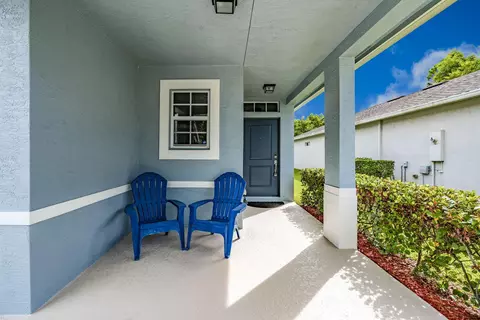 Exterior - 5557 SE Isabelita Ave, Stuart, FL 34997 photo 4 of 6